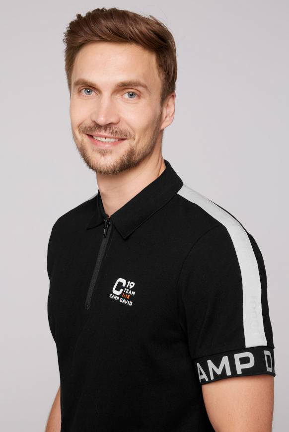 Soccx Poloshirt mit Zipper und reflektierenden Prints black Kostenloser Versand international